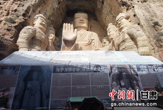時下，中國“石窟鼻祖”天梯山石窟第13窟大佛足部與局部危巖體搶救性保護項目正在施工。圖為施工現(xiàn)場。陳曉斌 攝